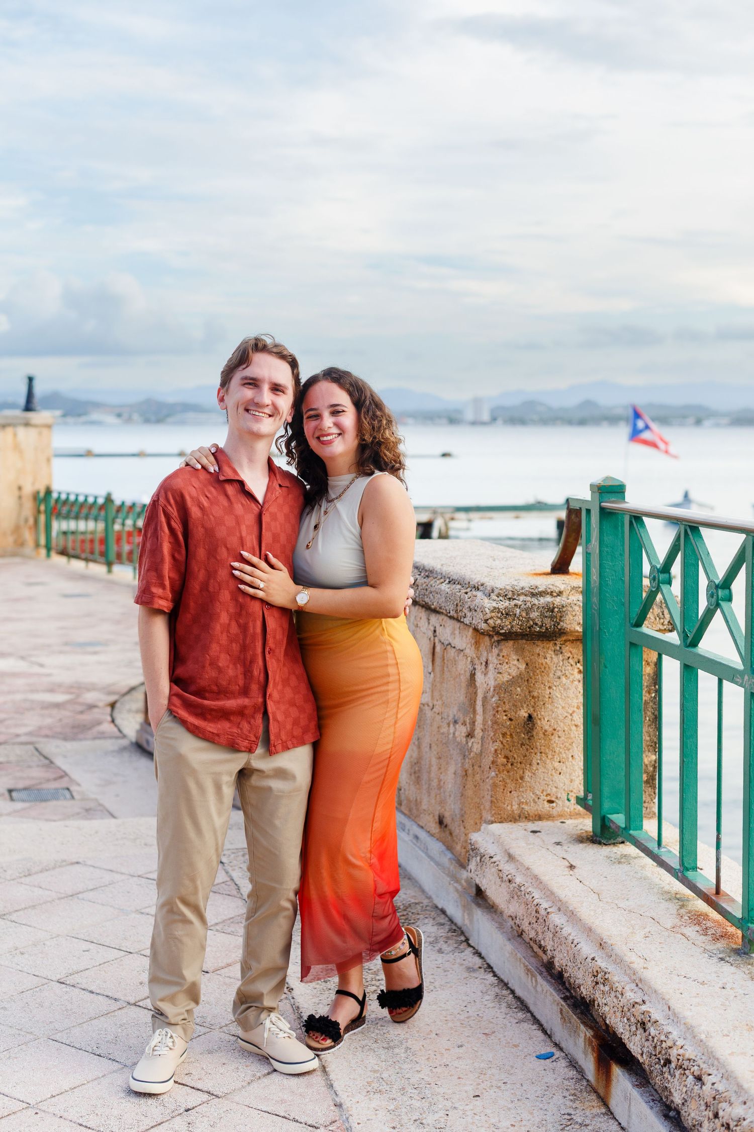 Surprise marriage proposal in Old San Juan, Puerto Rico. Paseo de la Princesa. Man and woman.