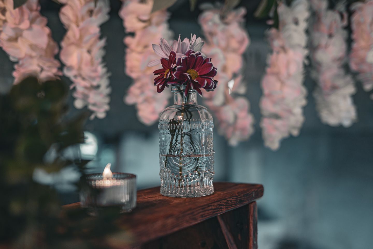 A floral display at Sopley Mill by Poole, Bournemouth and Dorset wedding photographer "kris the photographer"