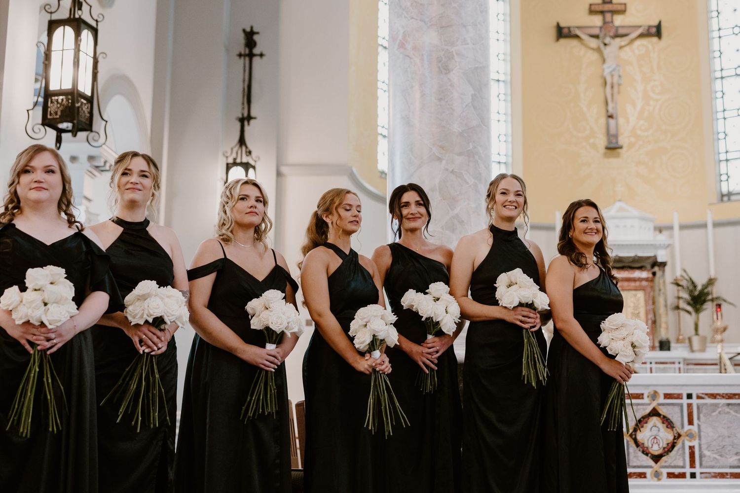 Bridesmaids watching bride walk down aisle at Sacred Heart Cathedral, Knoxville wedding photography
