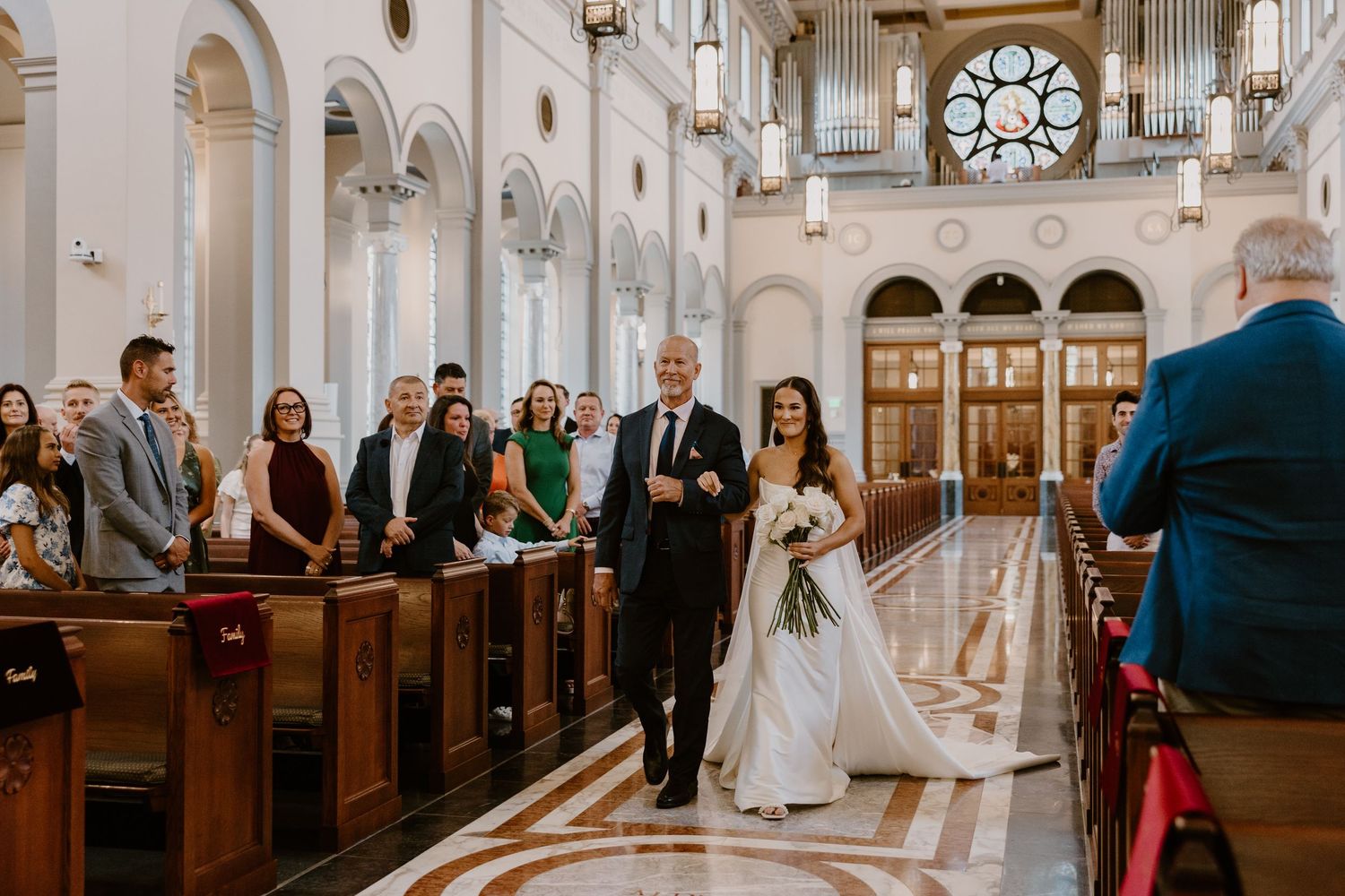 Bride walking down aisle with father at Sacred Heart Cathedral, Knoxville TN wedding photographer