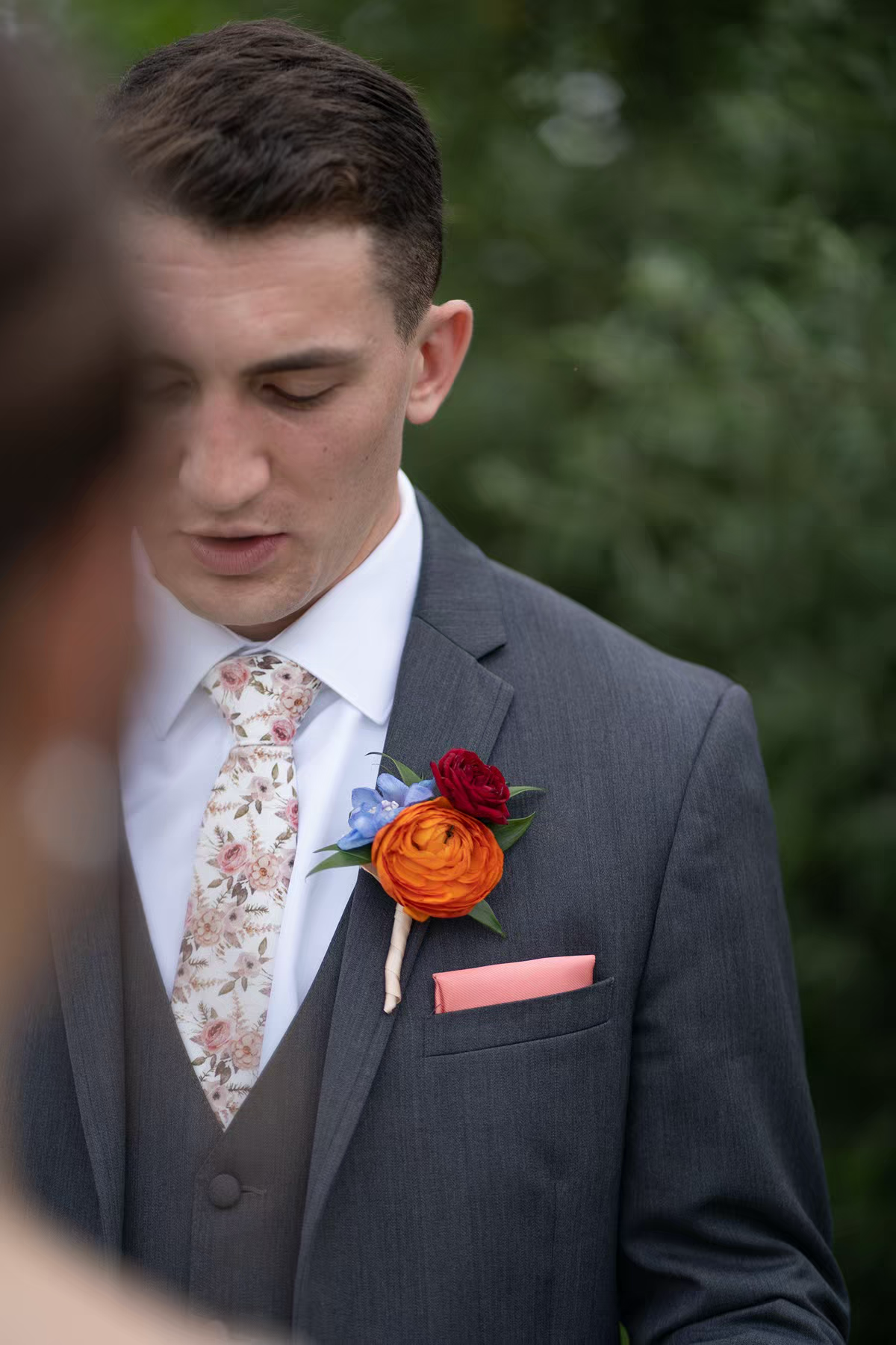 a groom reading letter to his bride in Nationwide Conference Center