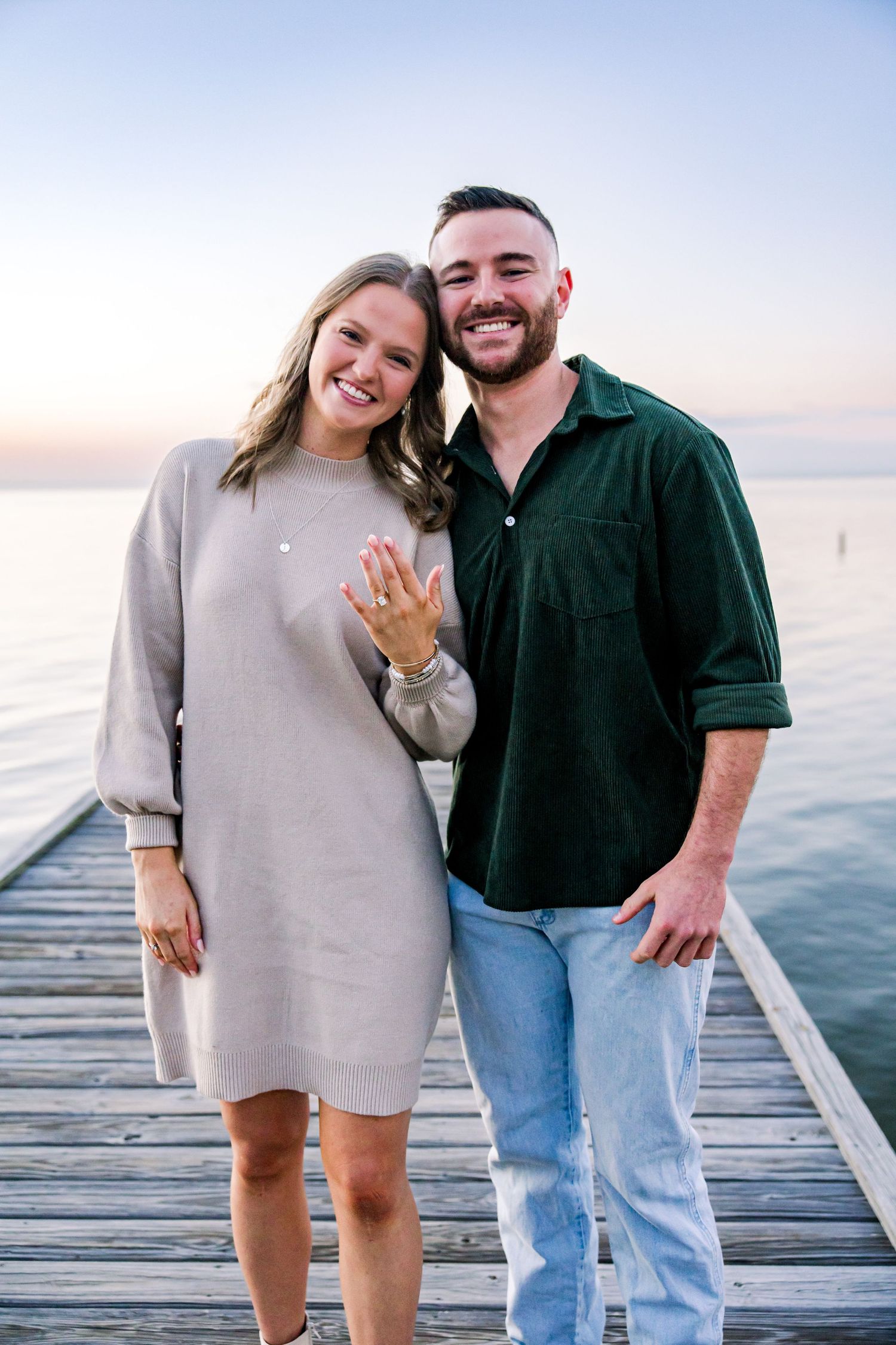 Proposal session on a quiet pier in fairhope alabama overlooking the mobile bay