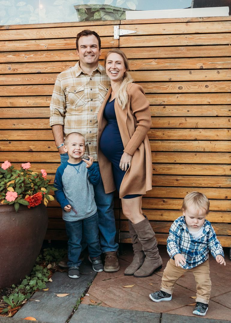 A series of candid family photos against a wooden slat wall showing playful moments and interactions.