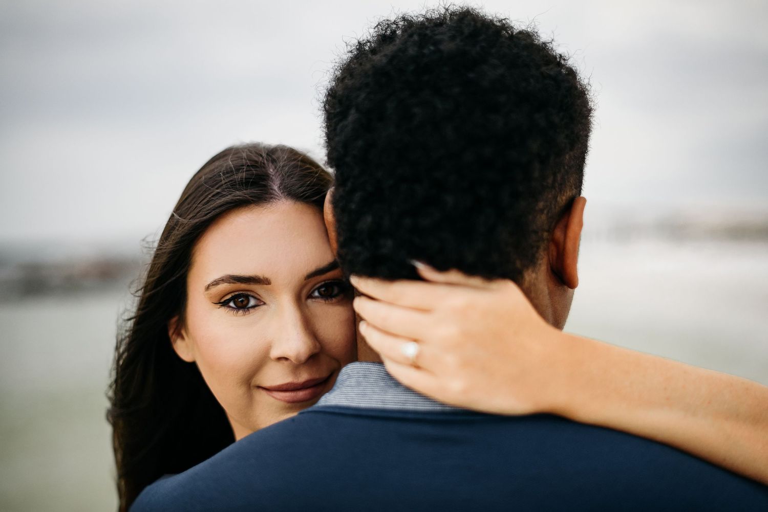 MJphotograph captures couples surprise proposals on the beach during sunset time. Highly rated and affordable engagement photography service