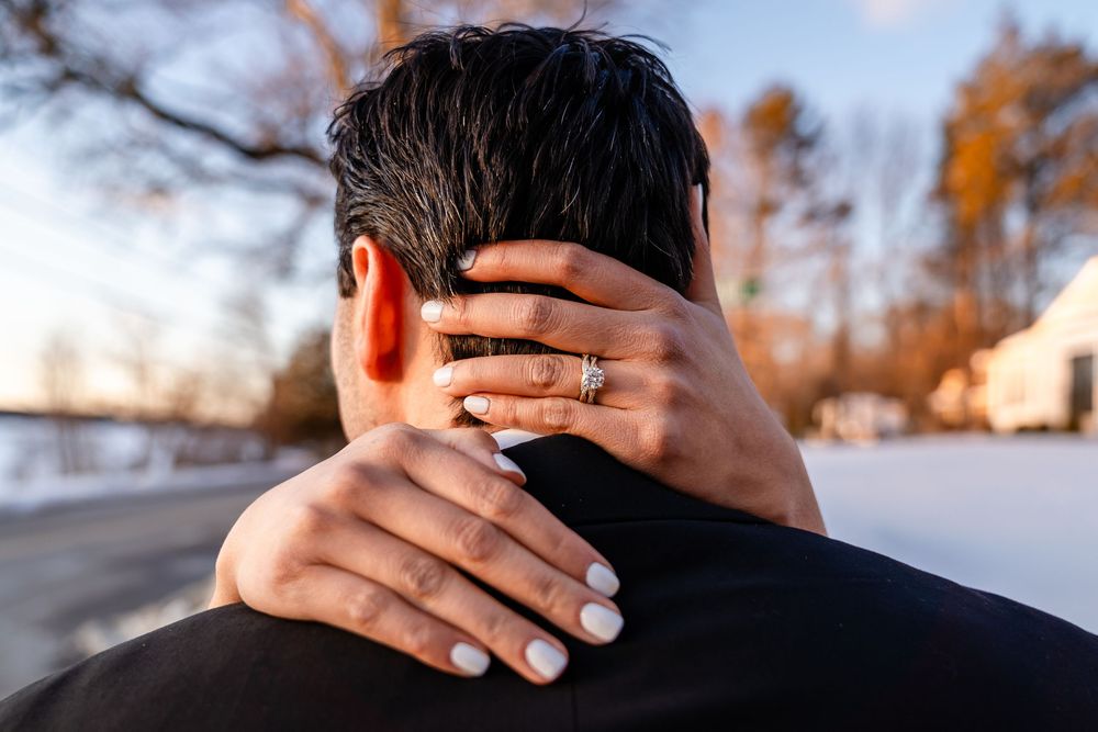 Golden hour wedding portrait highlighting ring at The Saphire Estate in winter
