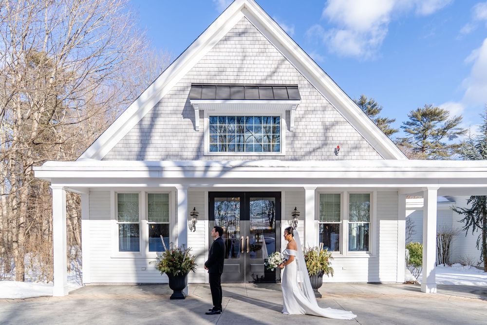 Romantic winter first look outside chapel at The Saphire Estate in Sharon Massachusetts