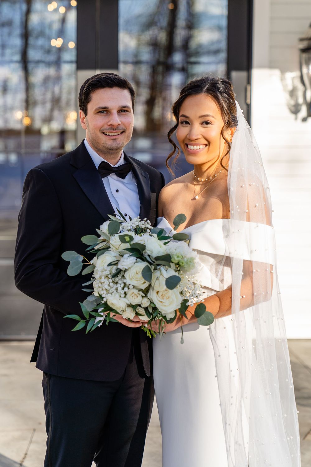 Romantic outdoor wedding portrait at The Saphire Estate with eucalyptus bouquet.