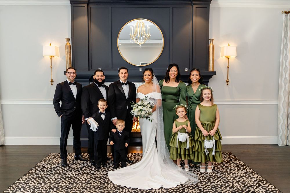 Wedding party gathered for formal portrait during Saphire Estate wedding