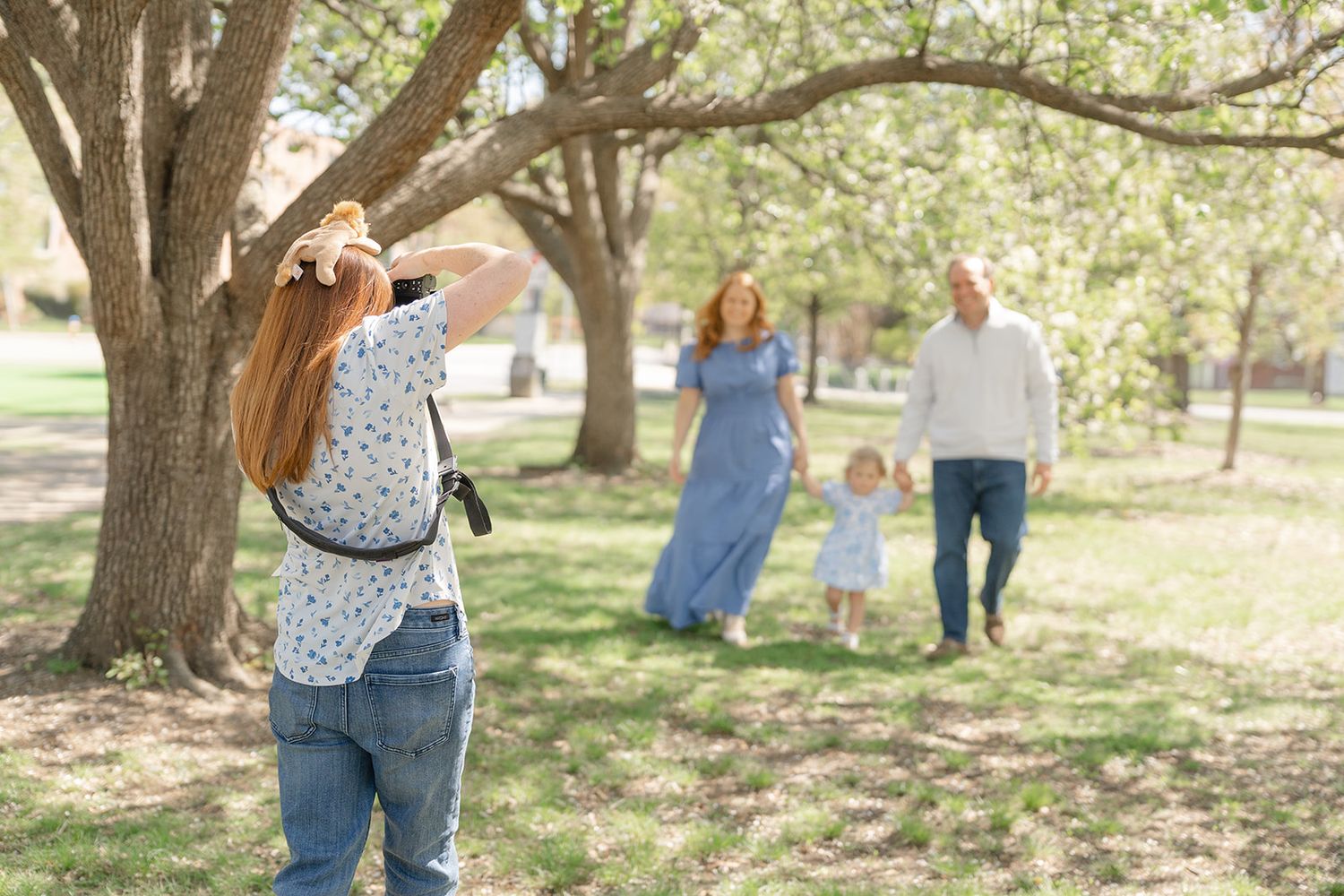 Northern Virginia family photographer Sarah Thayer at work during an outdoor family session