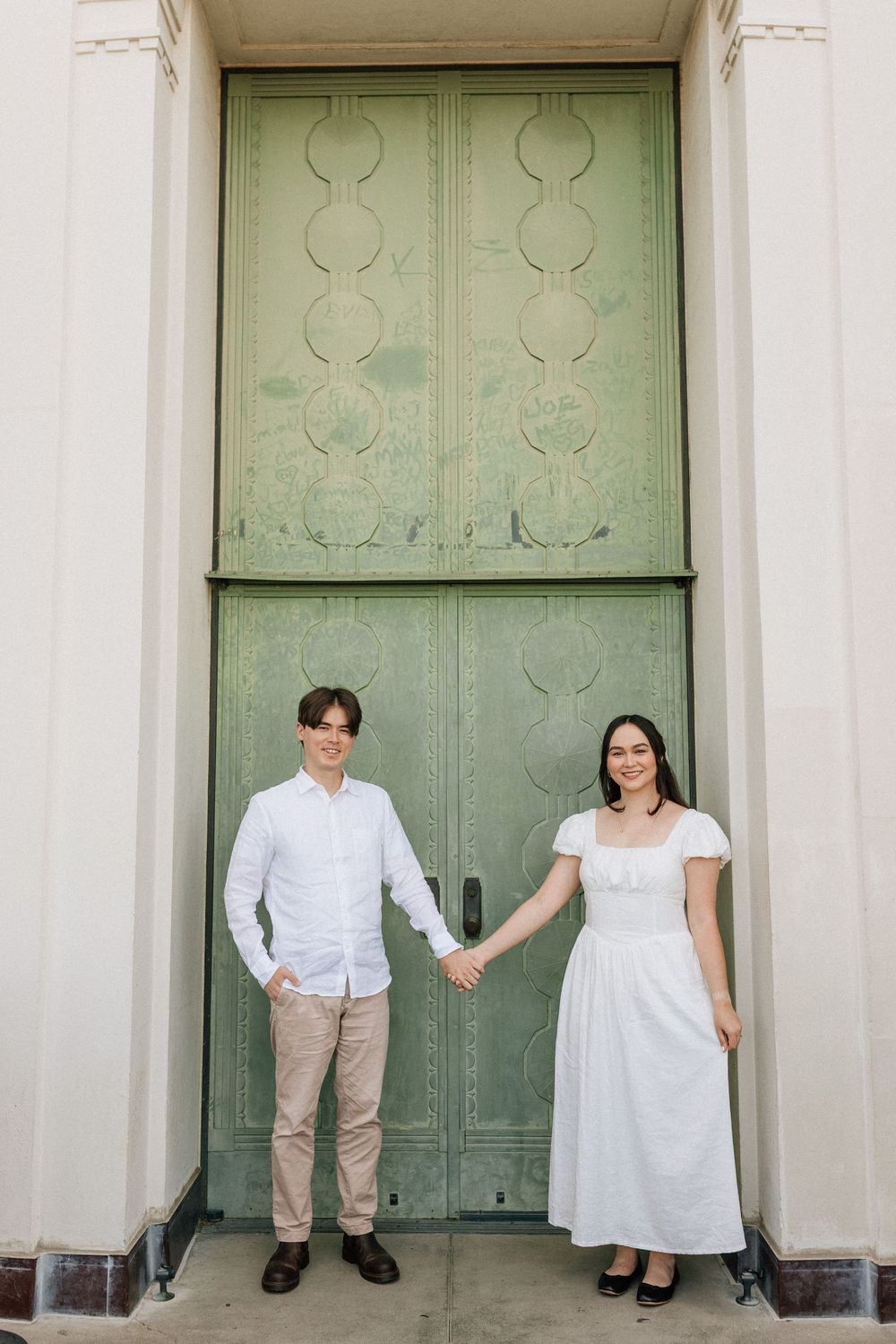 Documentary engagement photography at Griffith Observatory, featuring Kodak 35mm film by a Carolinas-based photographer.
