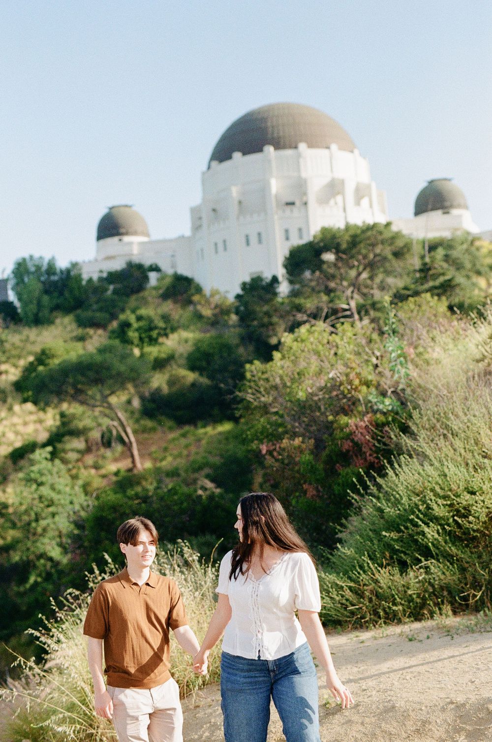 Candid Griffith Observatory engagement session on 35mm film, captured by a Asheville documentary wedding photographer.