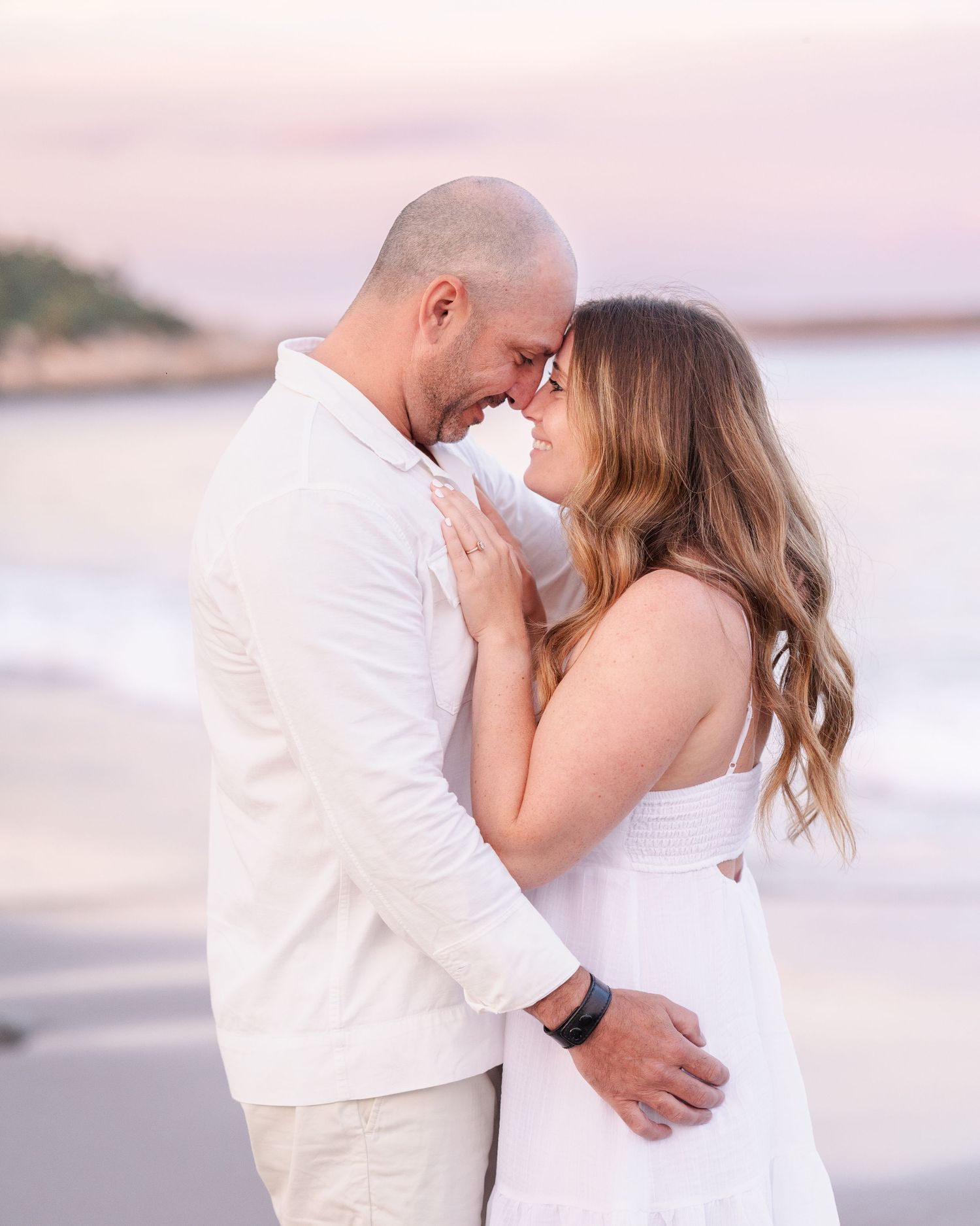 Golden Hour Engagement photos capturing true emotion and love, backed with a beautiful cotton candy coloured sky.