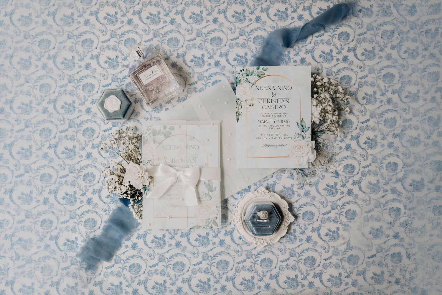 fine art wedding stationery styling with ribbon and delicate details