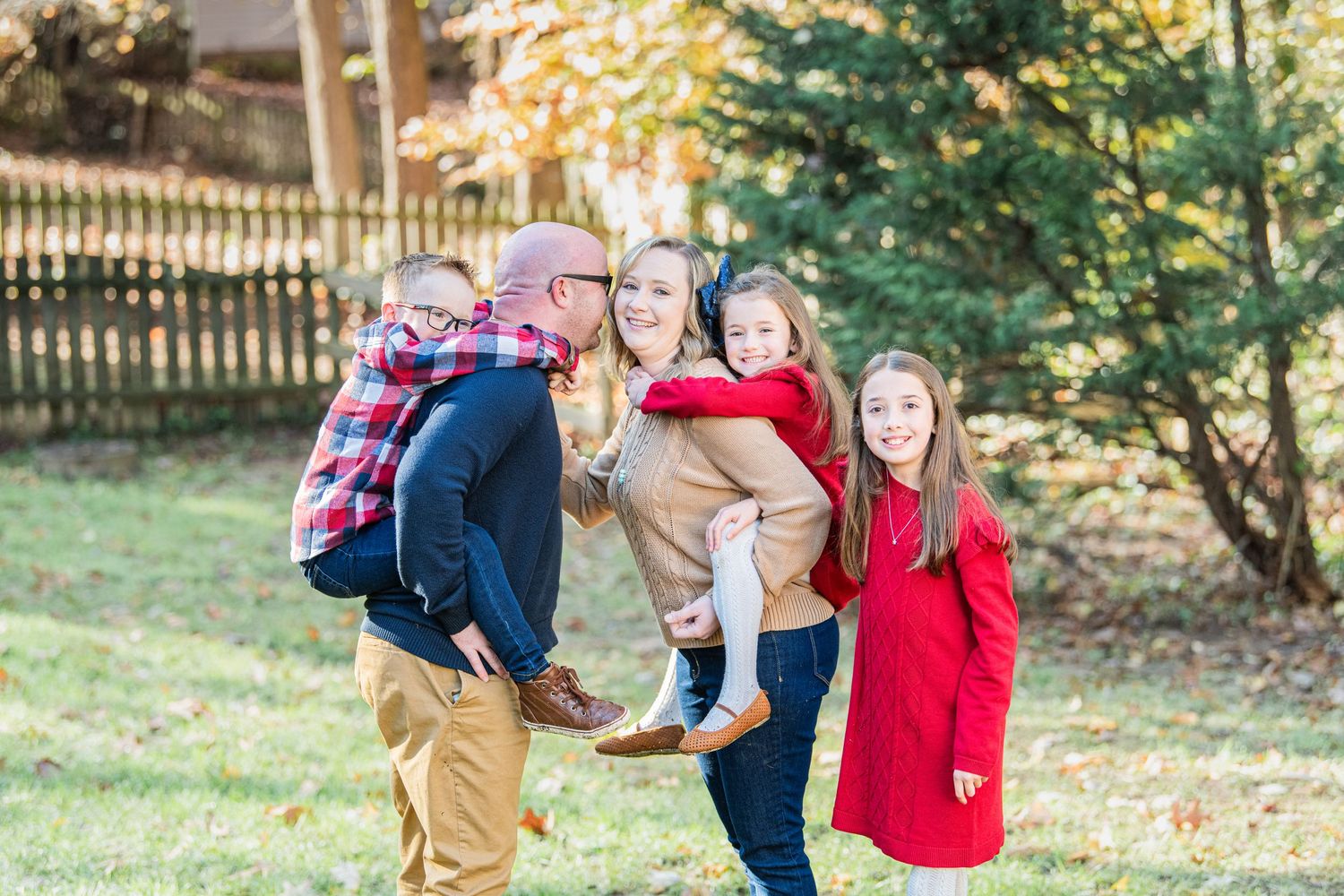 A beautiful family sharing their love and connection during a heartwarming holiday session, capturing joyful moments and cherished memories