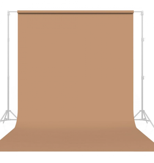 Photography studio setup with tan colored seamless paper backdrop.