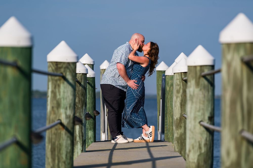 A sequence of photos showing a person positioning white pyramid-shaped caps onto wooden dock posts.