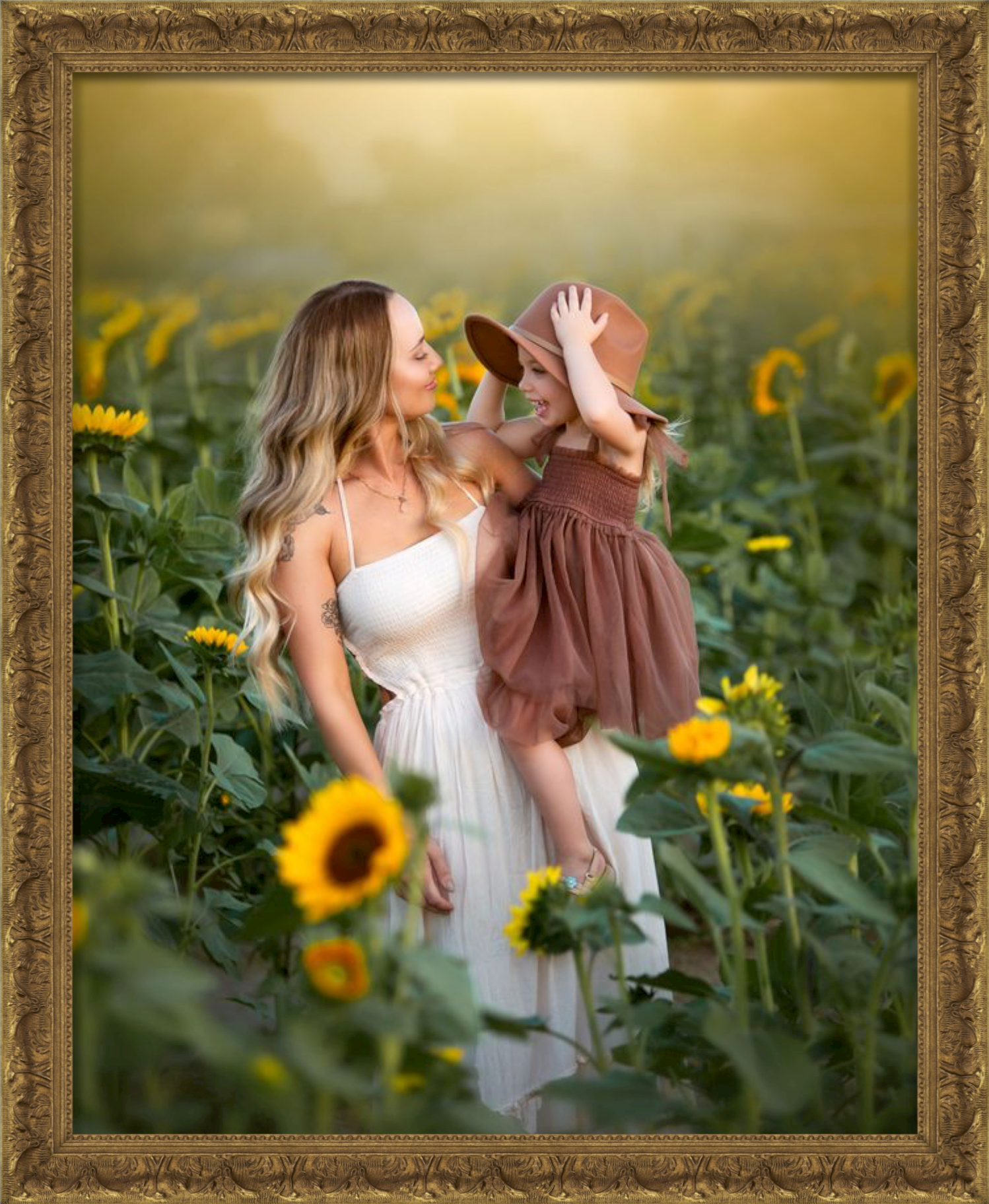 Best Las Vegas Family Photographer capturing emotional timeless mommy and me portraits in a sunflower field.  Fine Art Family Photography.