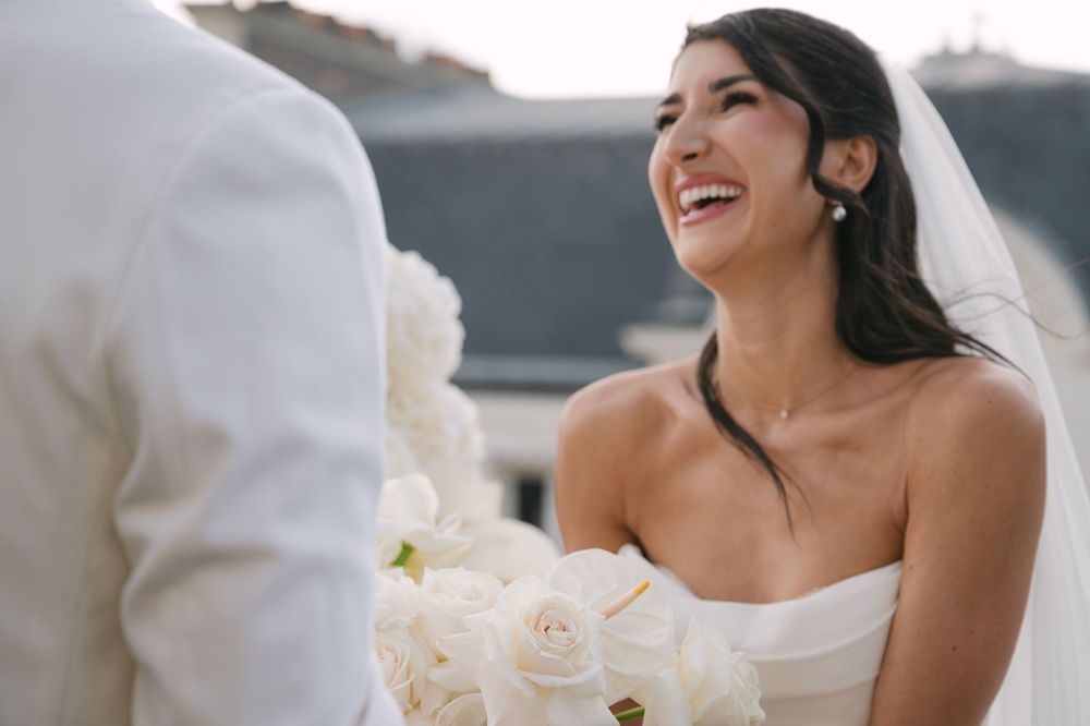 Candid moments of joy and laughter during a wedding celebration on a sunny day.