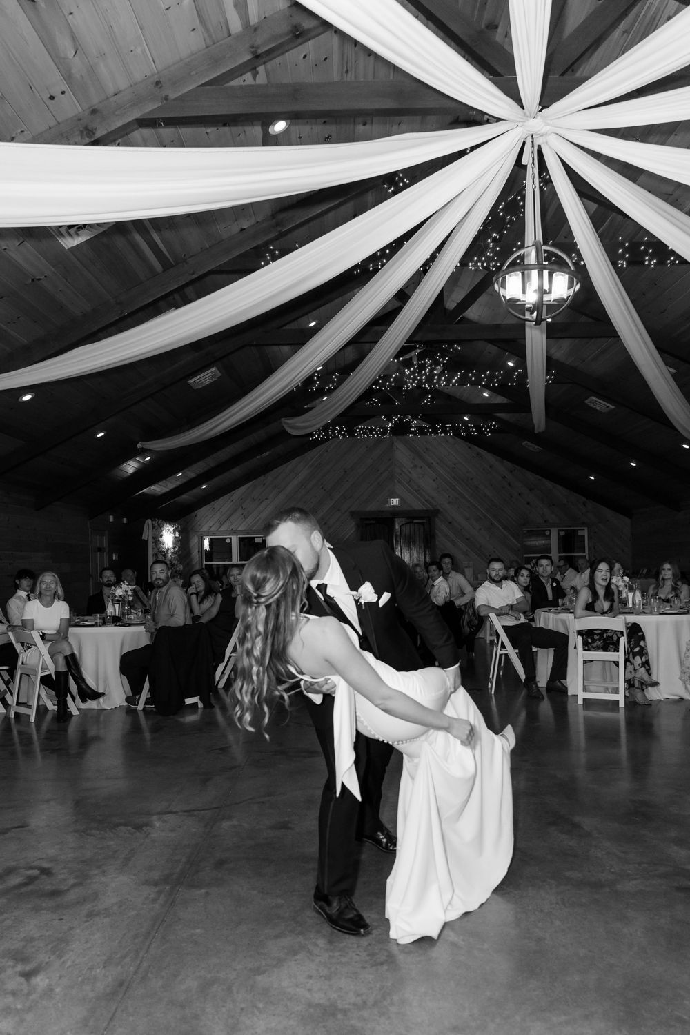 Bride and Groom ending intros with a dip kiss at The Venue On Lake Grant in Mt. Orab Ohio: Cincinnati Ohio wedding photographer