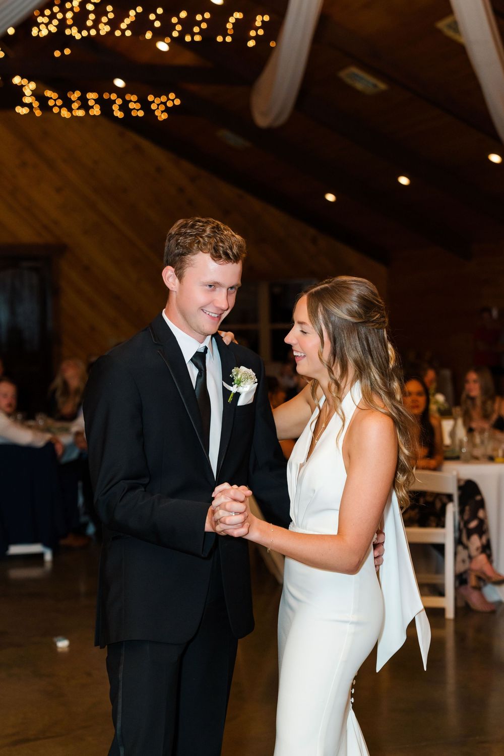 Bride and brother dancing during the reception at The Venue On Lake Grant in Mt. Orab Ohio : Cincinnati Ohio wedding photographer