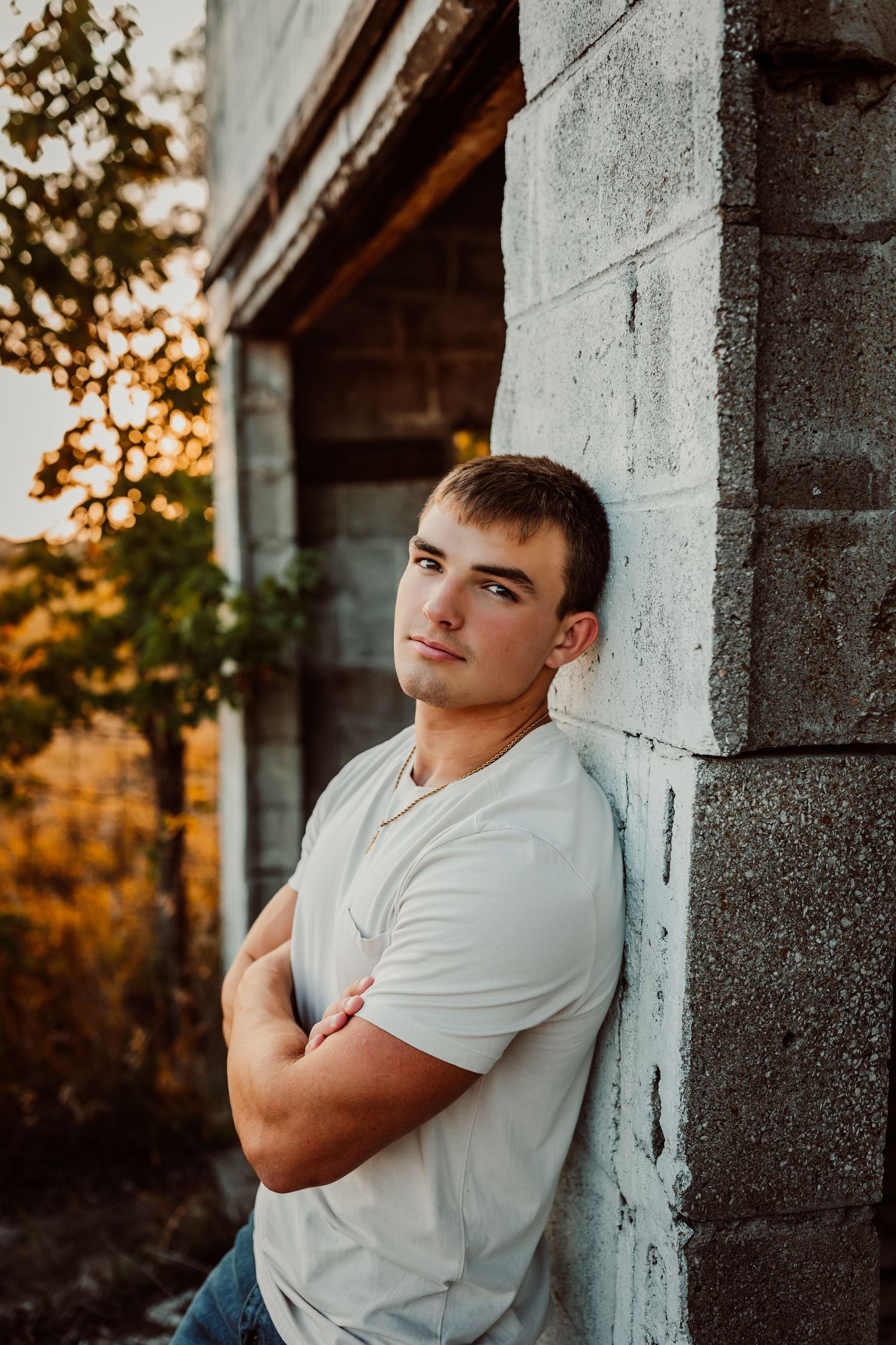 Senior photography in Kansas featuring an outdoor location and relaxed posing