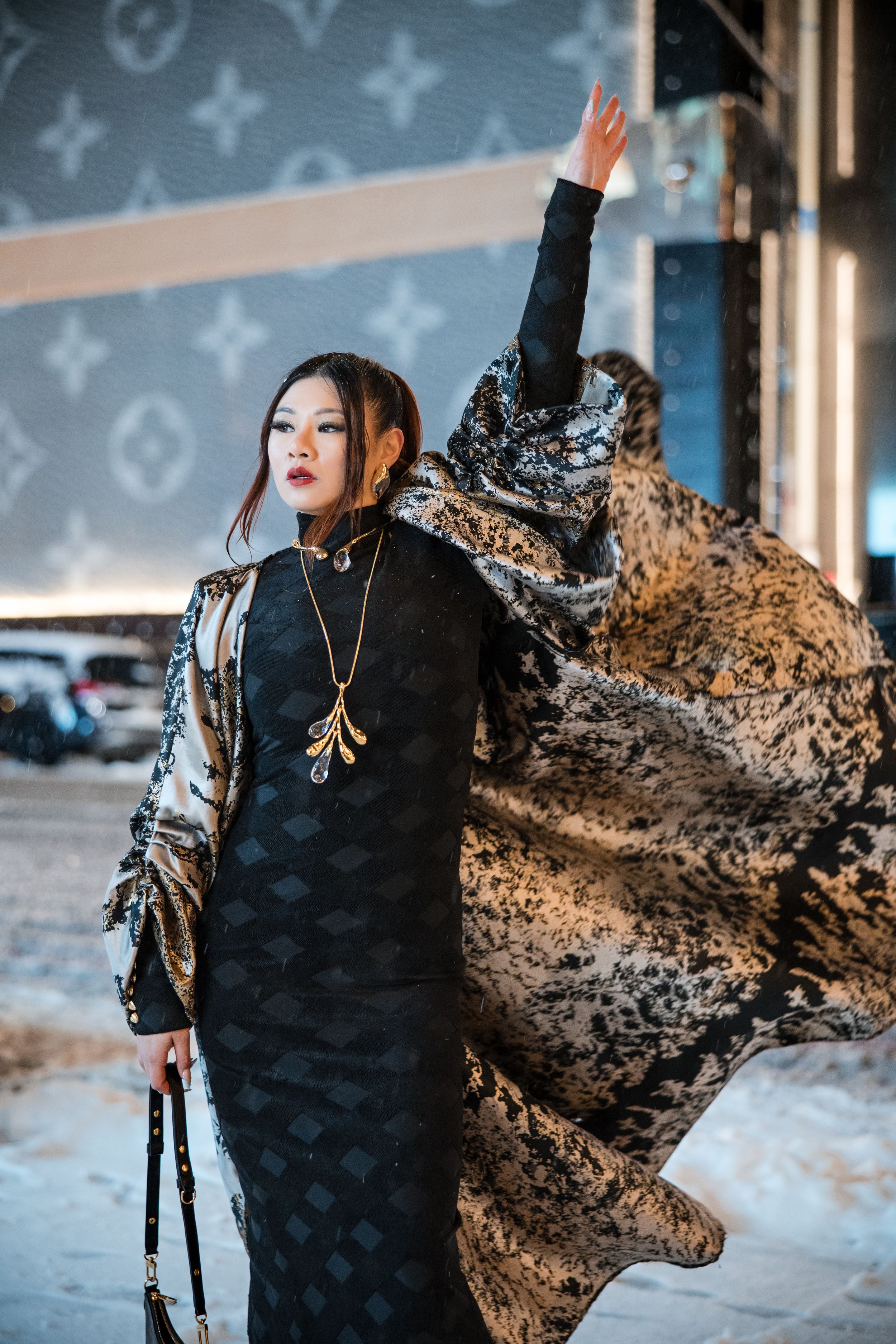 A fashion photo sequence showing a flowing leopard print coat billowing dramatically against an urban backdrop.