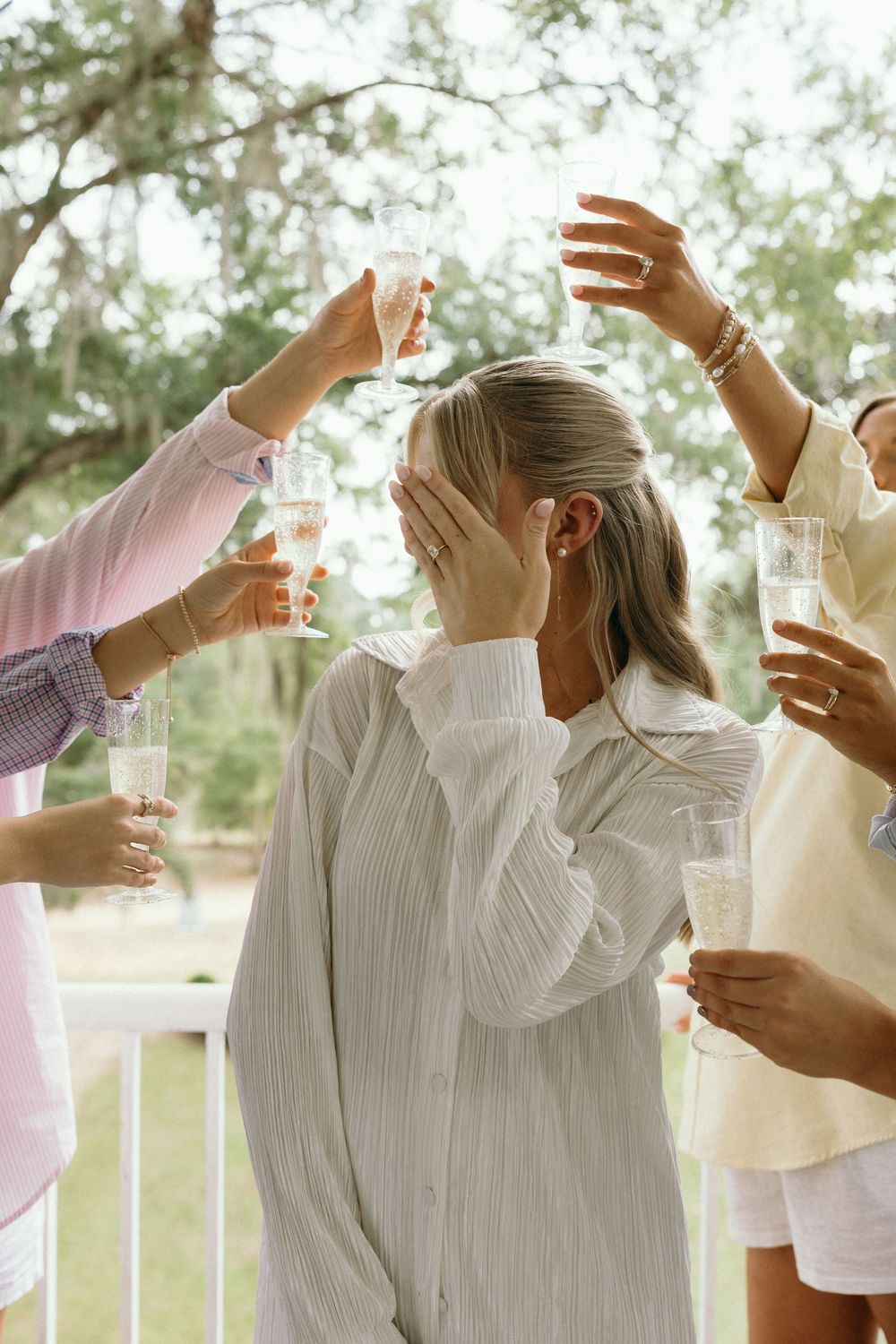 Bride and bridesmaids getting ready together at The Elms of Coosada in Coosada, Alabama