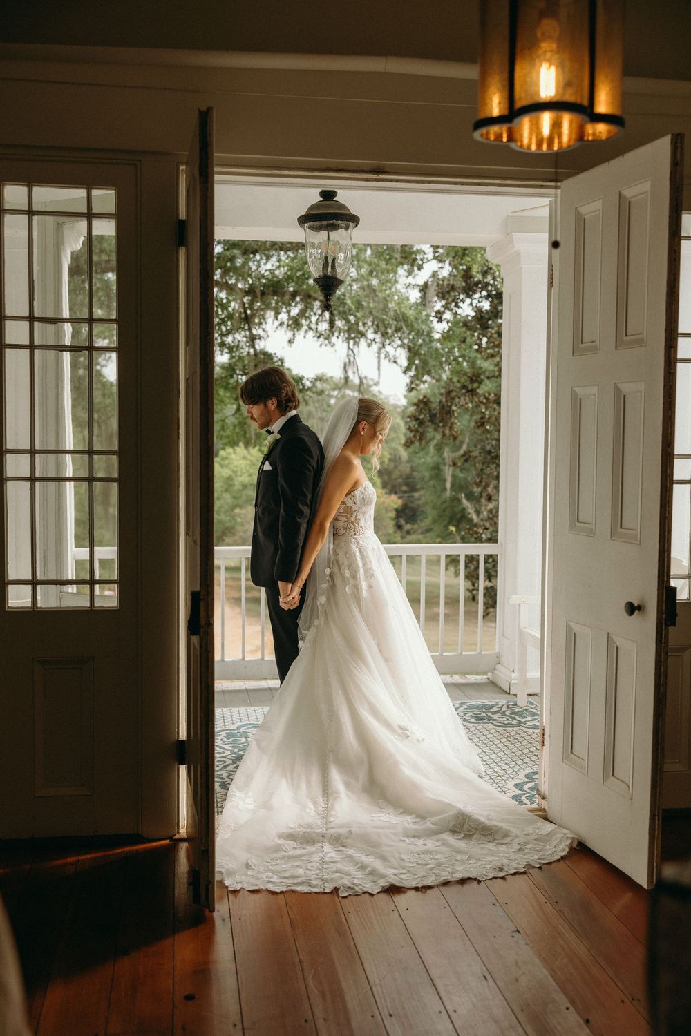 Bride and groom first look moment at The Elms of Coosada in Coosada, Alabama
