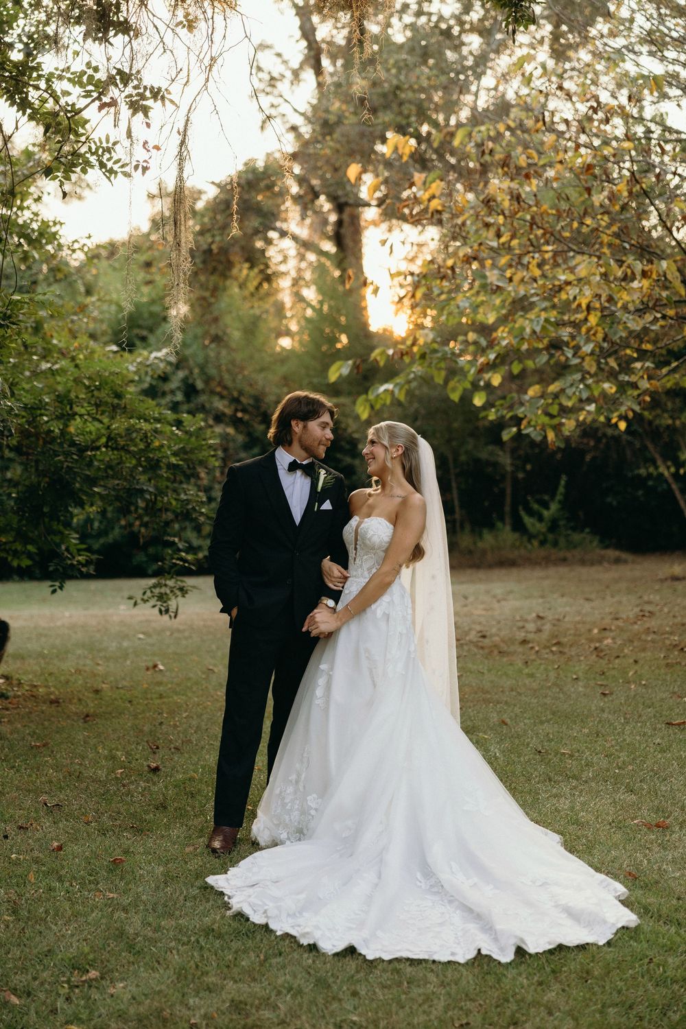 A wedding couple during golden hour at The Elms of Coosada in Coosada, Alabama