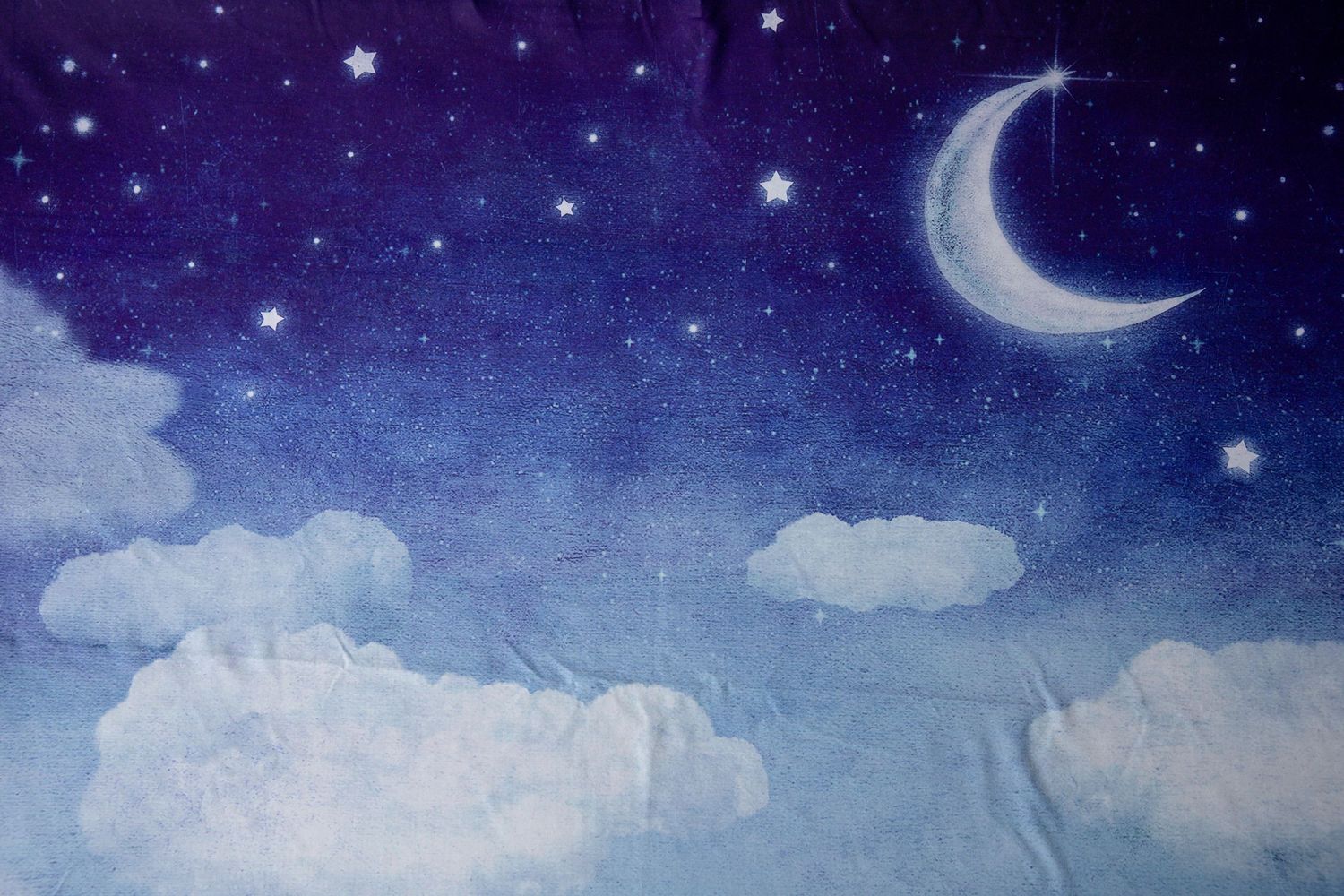 Dreamy night sky backdrop with crescent moon, stars and clouds for photography.