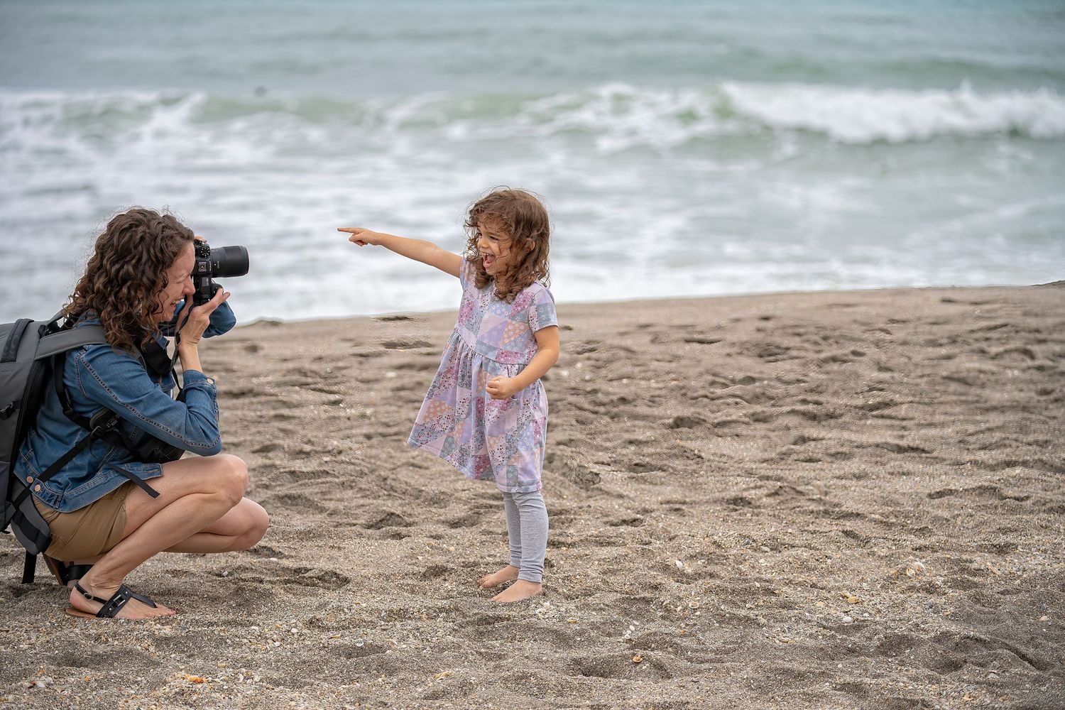 My adorable niece, Evelyn, on Jupiter Beach, being photographed by Casey Thomas Photography.