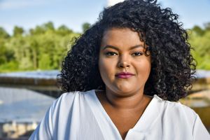 Professional outdoor portrait series showing a person with curly black hair against a sunny waterfront background.