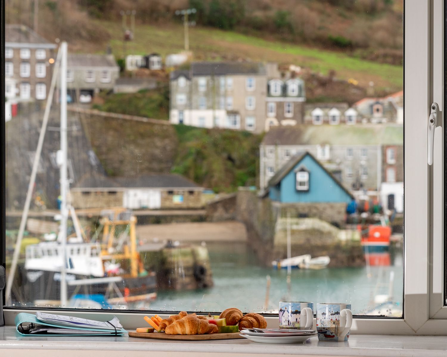 view of mevagissey harbour from hideaway- mevagissey property photographer