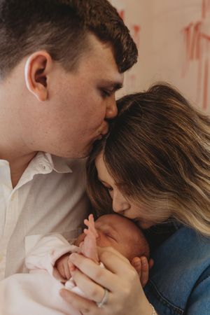Warm family portrait showing closeness and connection.