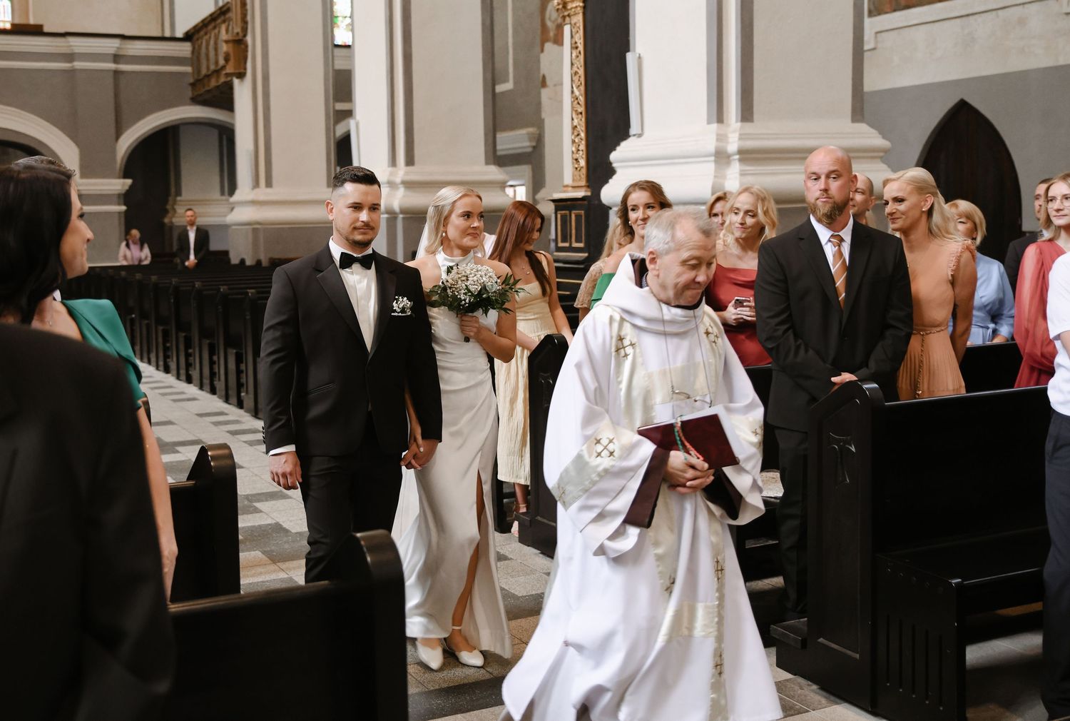 A series of wedding photos showing a couple celebrating with guests in a church setting.