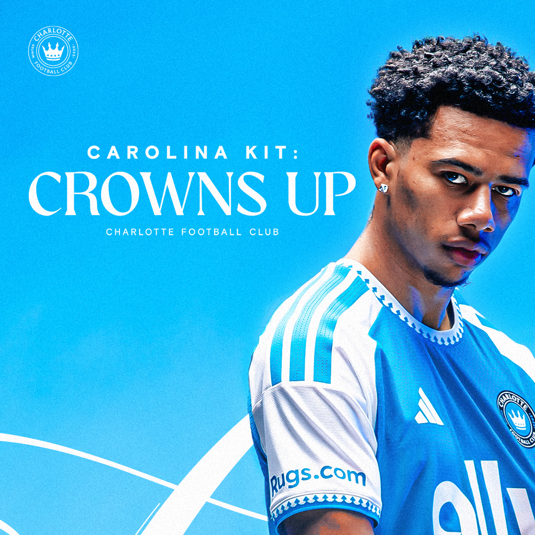 Charlotte FC player models the Carolina Kit in blue and white Adidas jersey for Crowns Up campaign.
