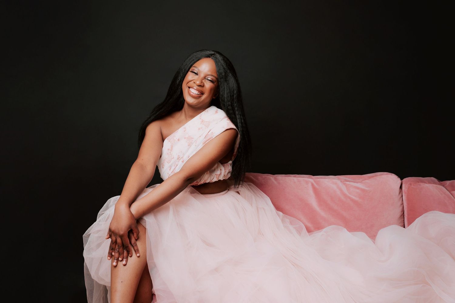 A series of photos showing someone in a flowing white dress posing against a dark background.