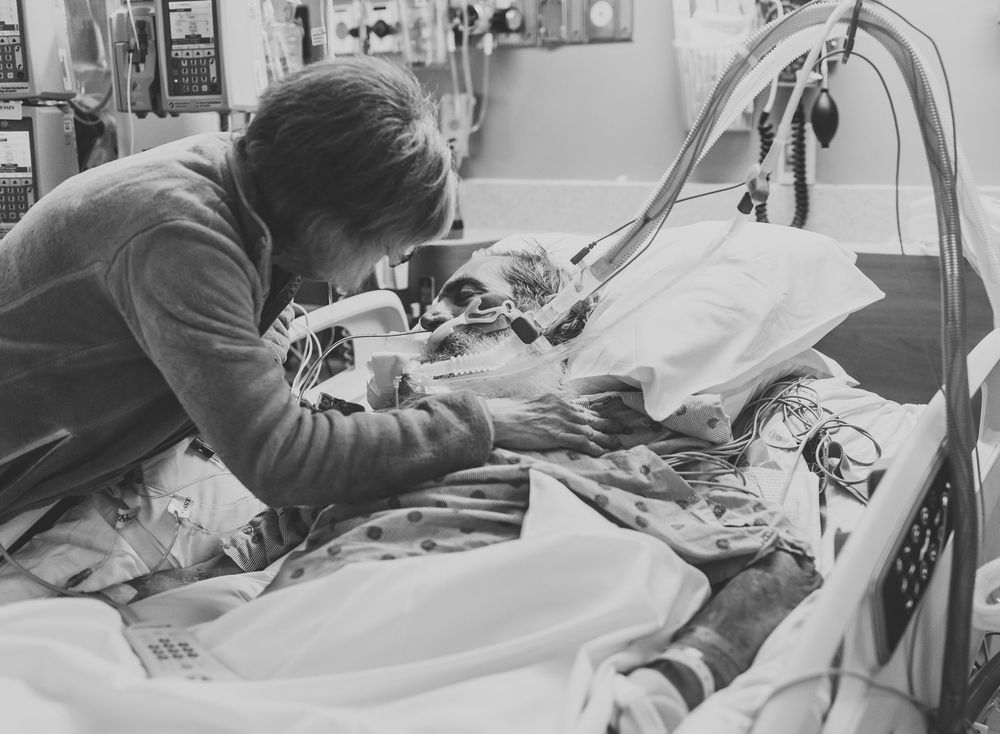 A series of black and white medical photos showing patient care and treatment in a hospital setting.