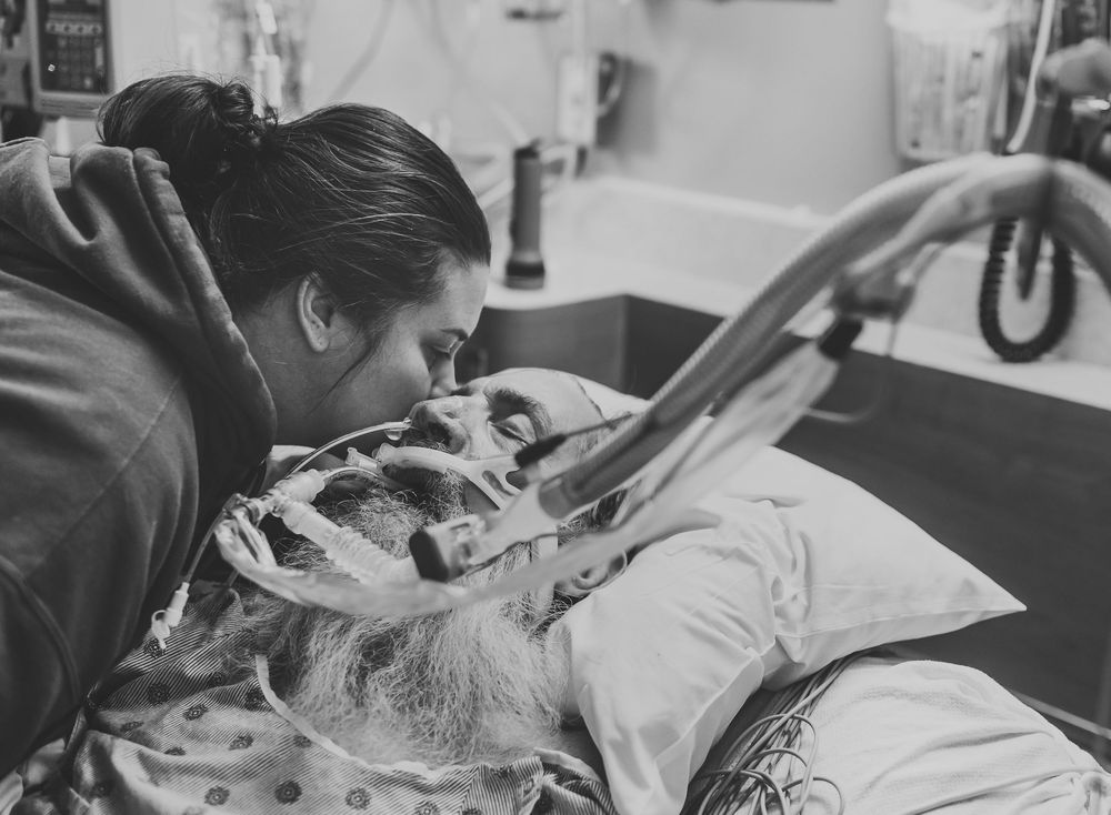 A series of black and white photos showing a medical team performing emergency care on a patient in a hospital setting.