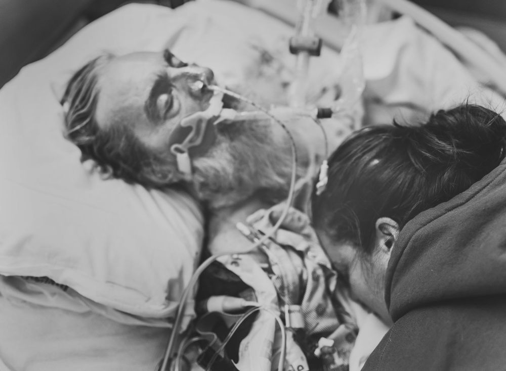 A series of black and white medical photographs showing patients receiving treatment in hospital beds.
