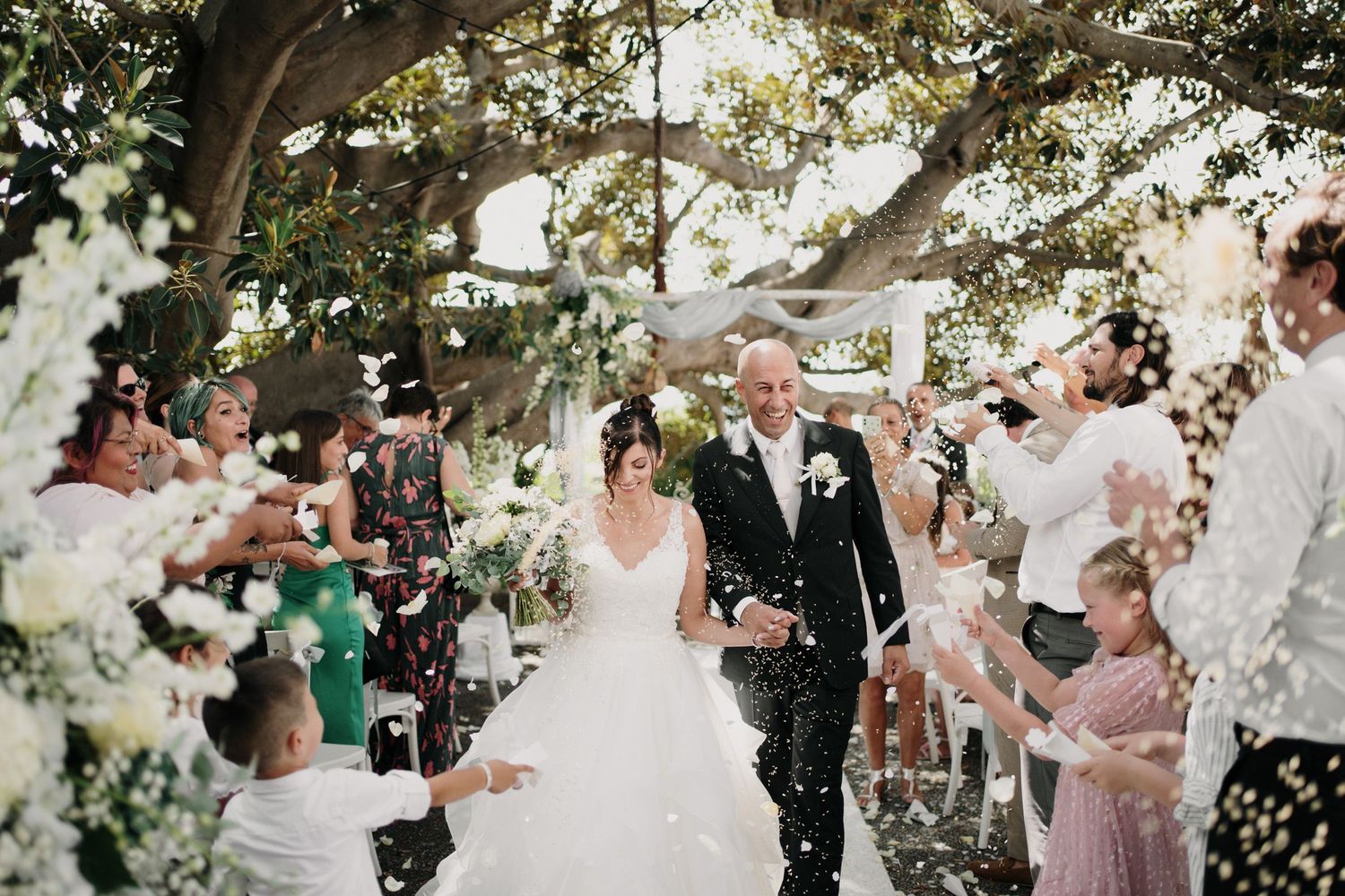 Throwing rice after a wedding at Villa Ormond, a wedding venue in Sanremo