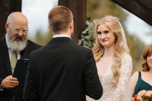 A wedding photo collage showing intimate moments between a bride and groom in an outdoor garden setting.