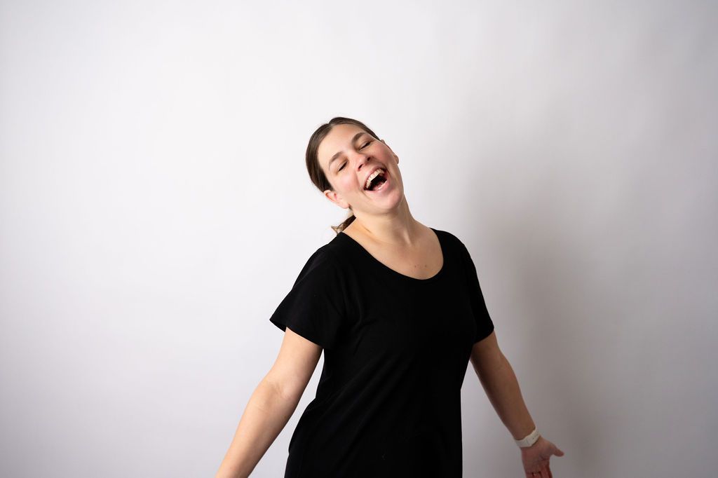 A person in a black t-shirt poses expressively against a white background in a series of dynamic shots.