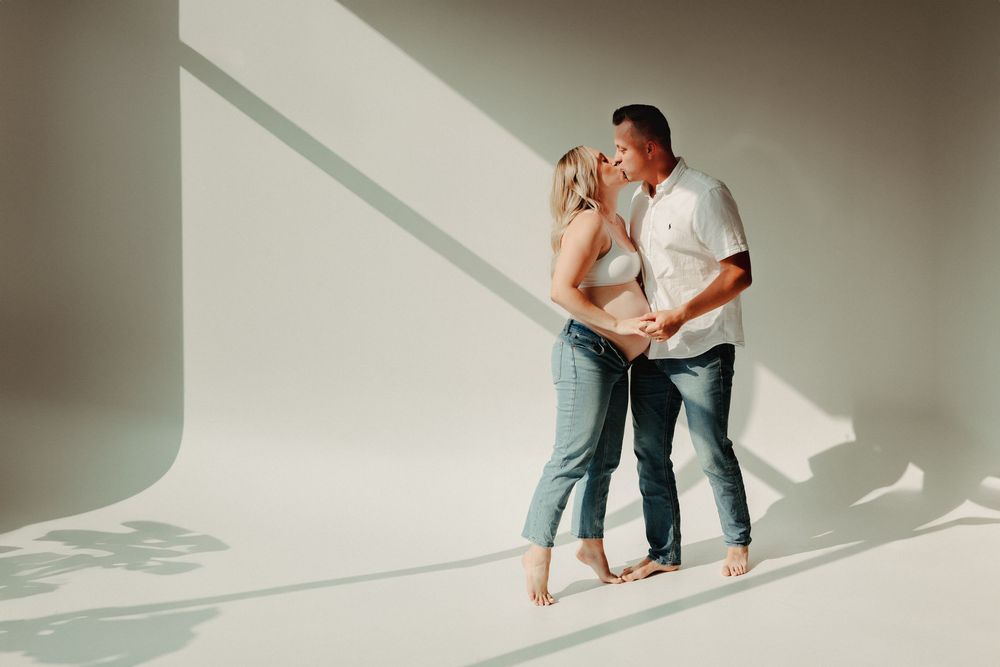 Studio maternity photos in Sioux Falls with a clean, timeless look.
