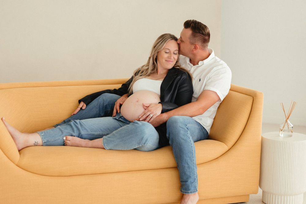 Modern studio maternity photography in Sioux Falls with a pregnant mother.