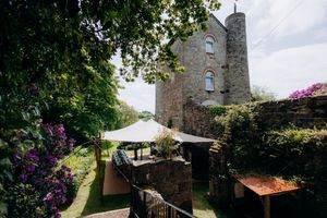 Guests enjoying a relaxed wedding morning in Cornwall.