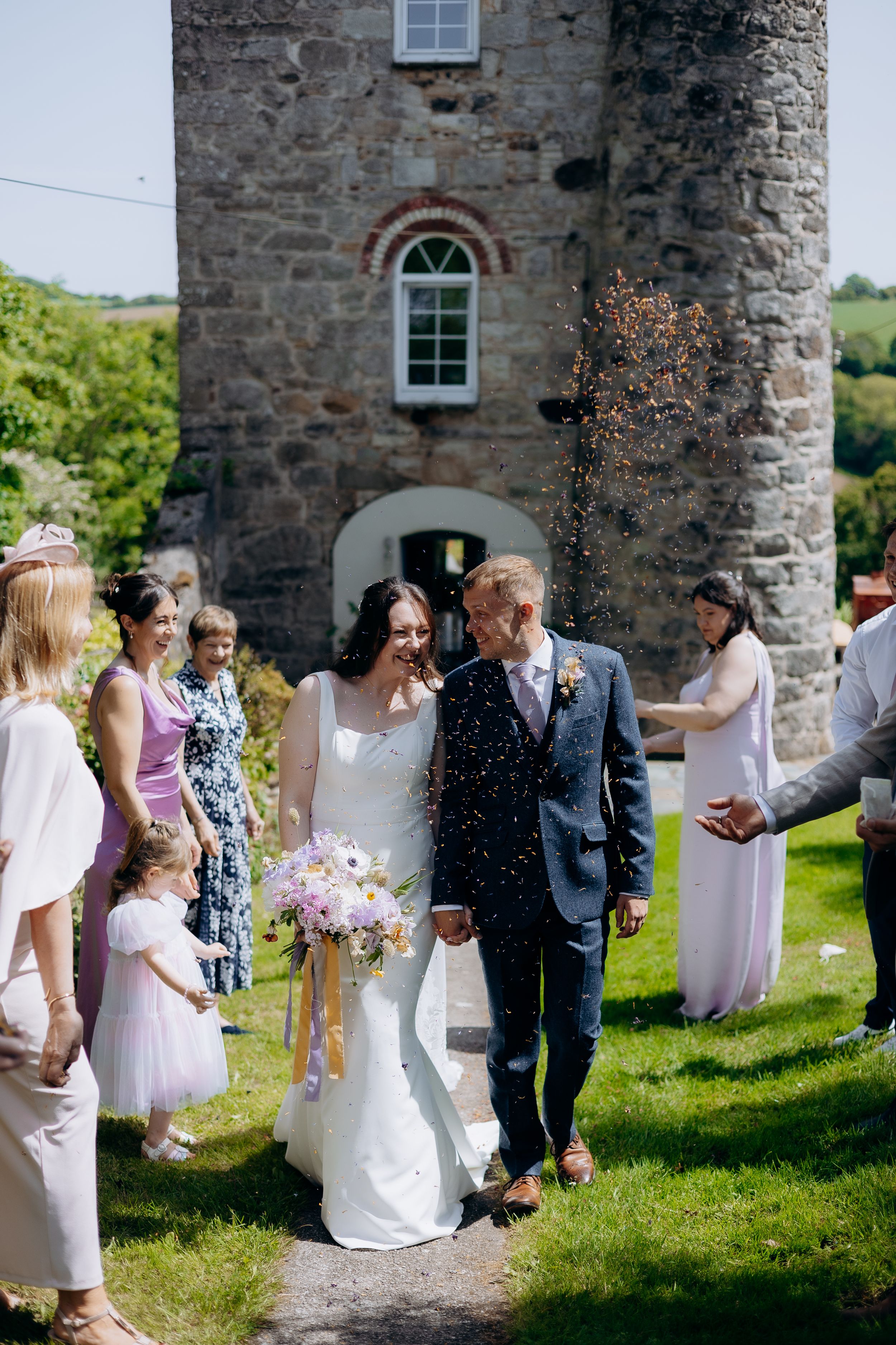 Cornwall wedding photographer documenting a relaxed wedding celebration.