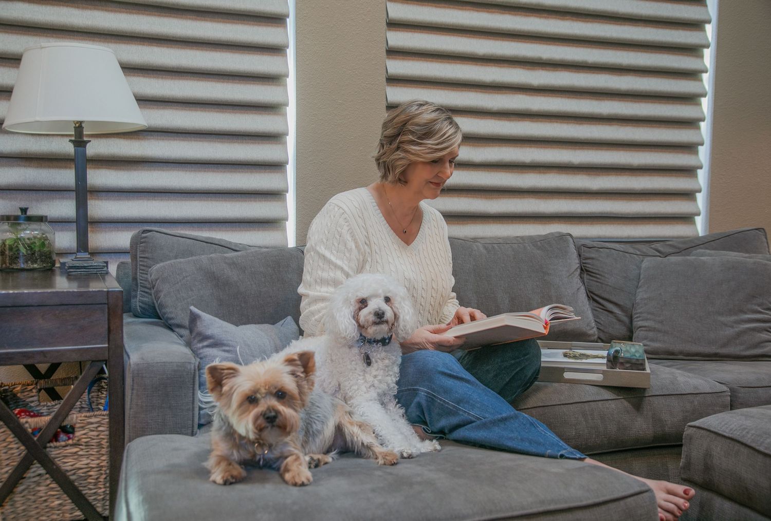 Real Estate Agent, Brand Photos, showcasing her love for her dogs, and home.