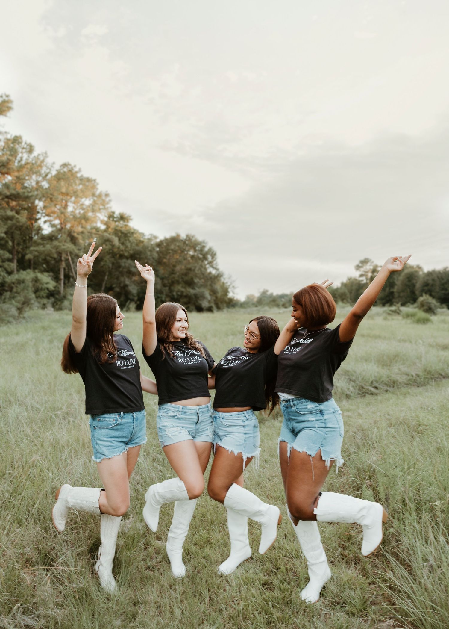Houston senior rep posing in golden hour field, Ro Luxe Portraits Class of 2026