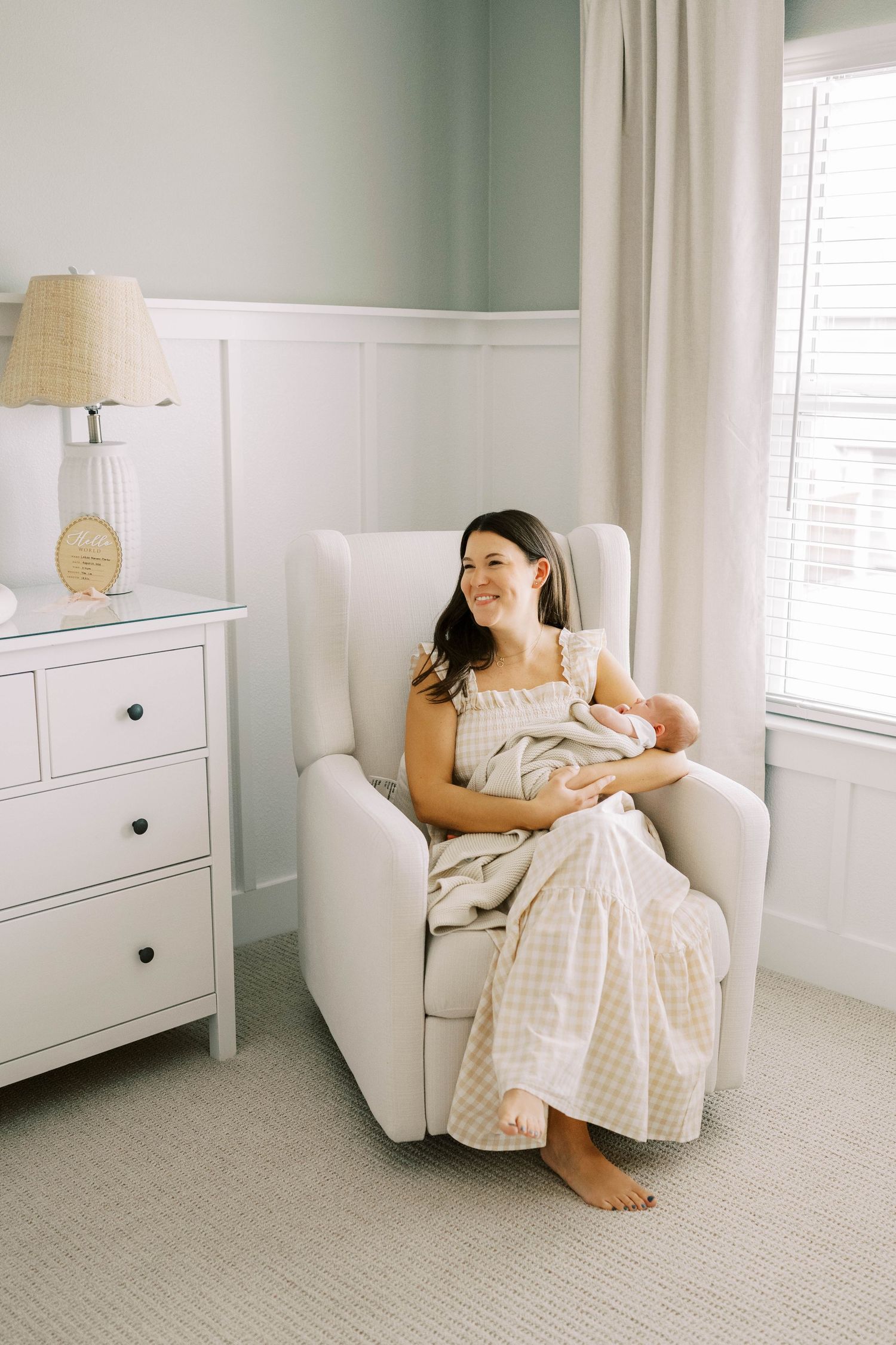 Lifestyle newborn session with parents in Frisco, Texas